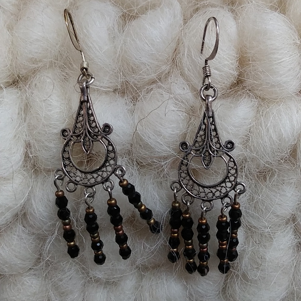 Black beads on filigree style earrings